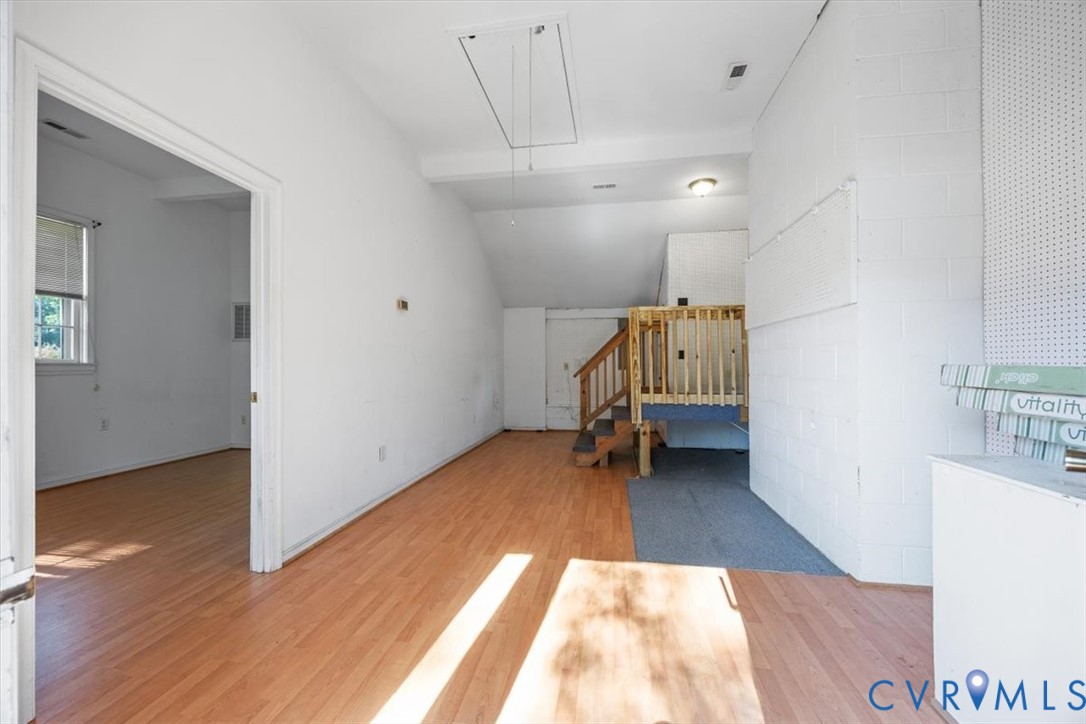 Mudroom with stairs to Den