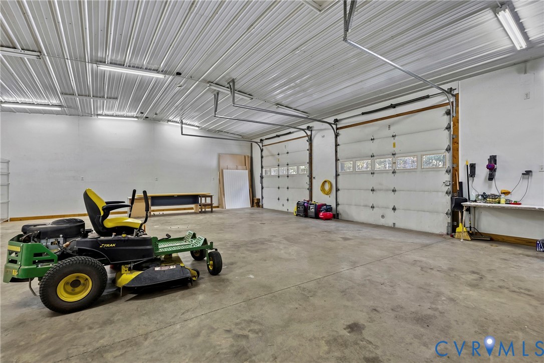 30'x40', 1,200 sqft detached workshop. lift-ready, AC, heated floors, bathroom
