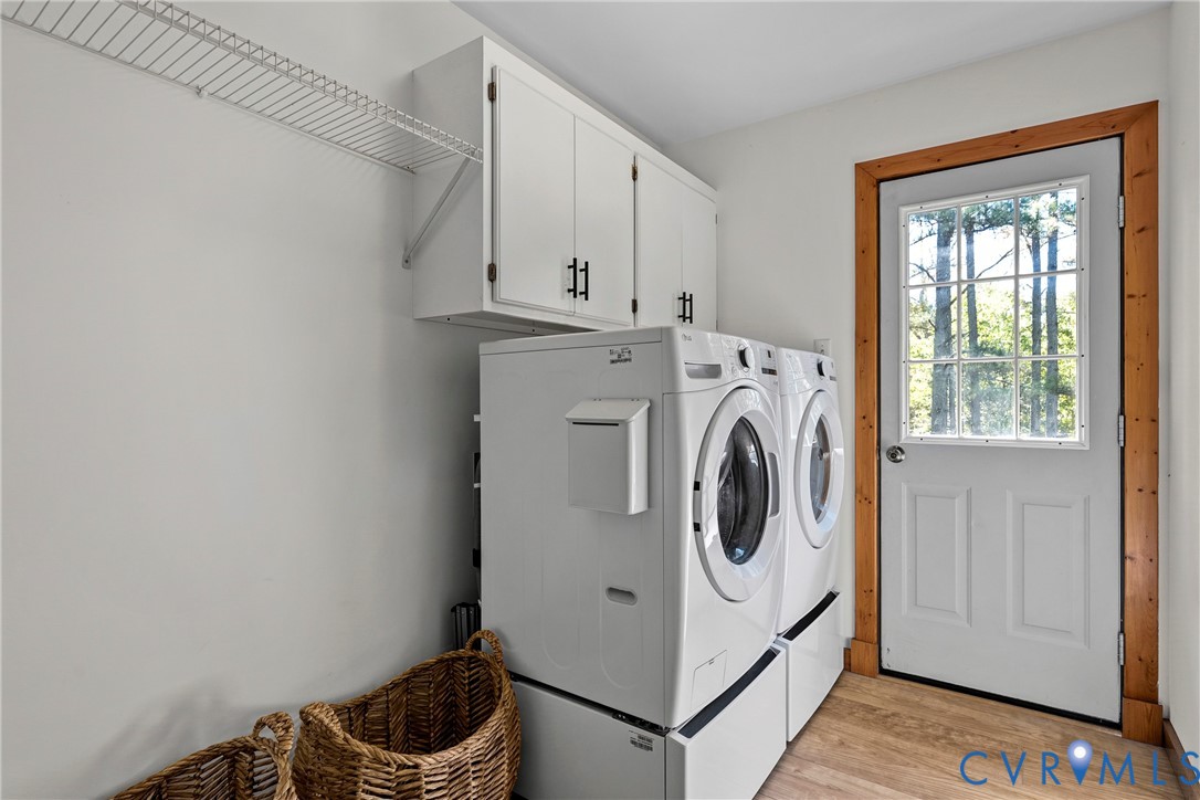 Laundry w/ deck access and pull-down attic access