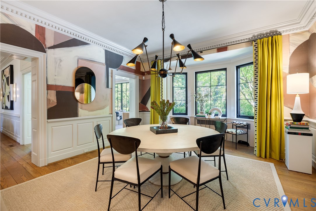 Dining room with Taos sisal grasscloth mural above the formal wainscoting.