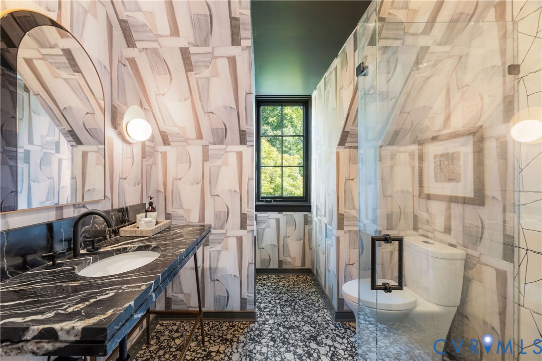 Third-floor bath with terrazzo floors, a Waterworks vanity and a new shower with Ann Sacks tile.