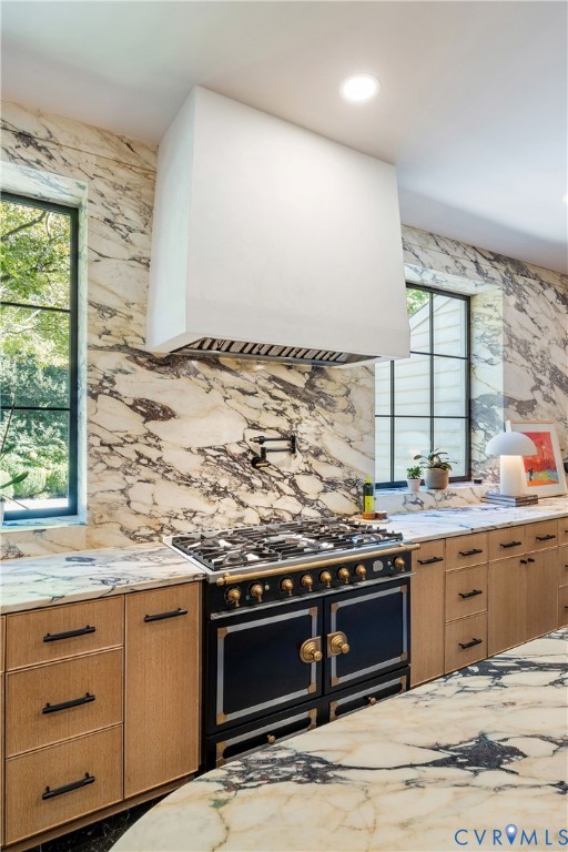 Built for a cook, with a pot filler, a second Wolf oven, a dedicated knife pullout and a built-in coffee maker.