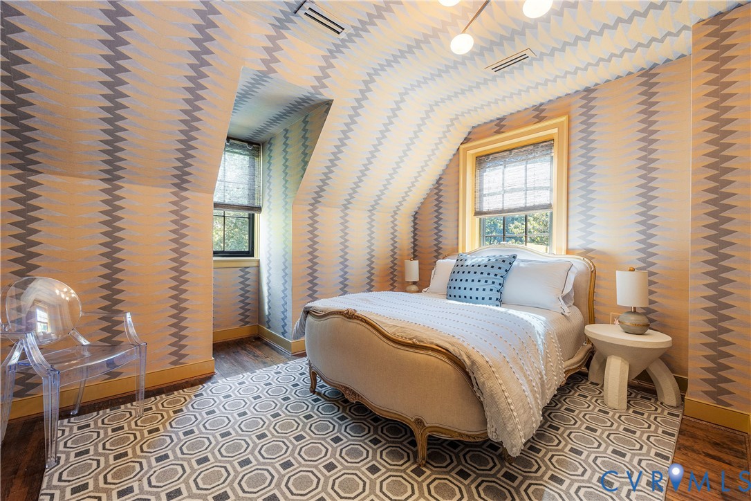 Third-floor guest bedroom with cedar closet.
