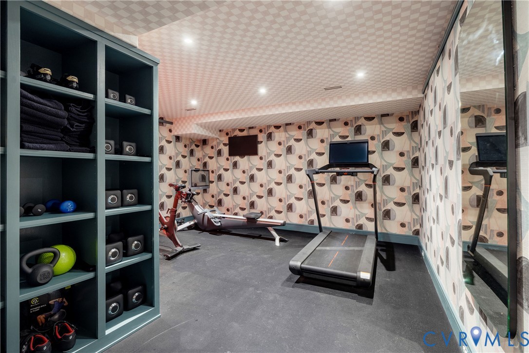 Exercise room with sauna, new HVAC, rubber floors and built-in cubbies.