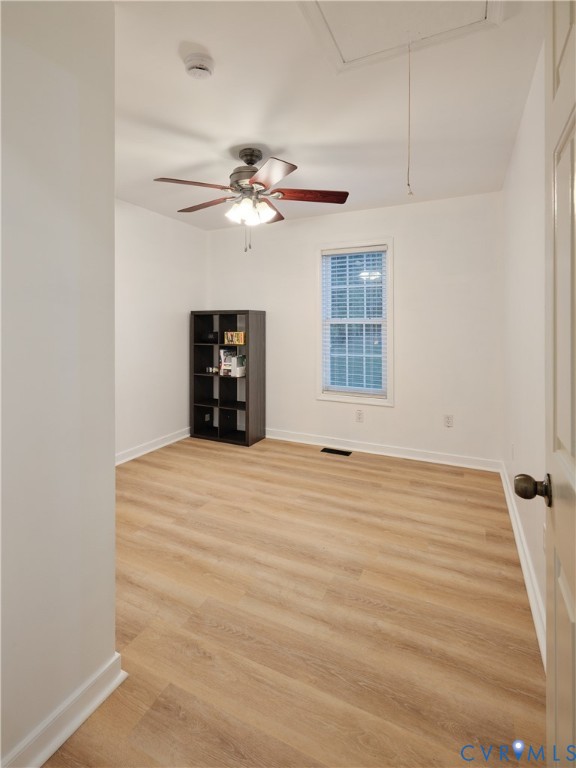 3rd of three bedrooms with shelved closet.
