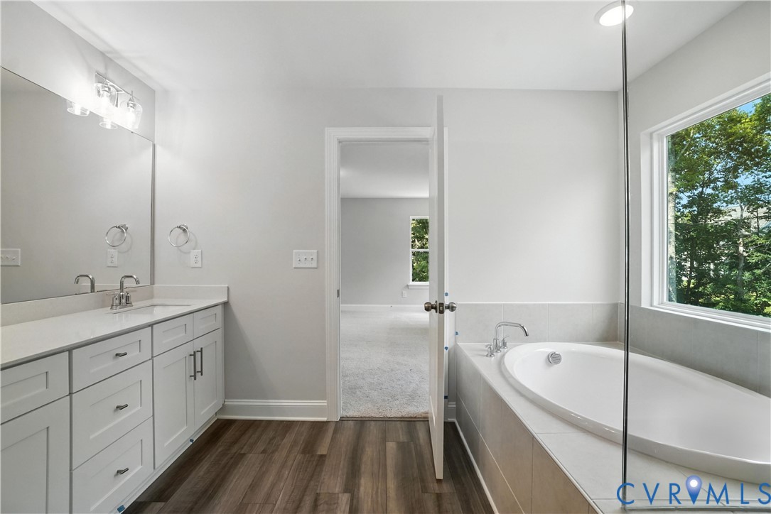 This home is UNDER CONSTRUCTION. The photo represents the plan, not the actual home. Design selections have been made.