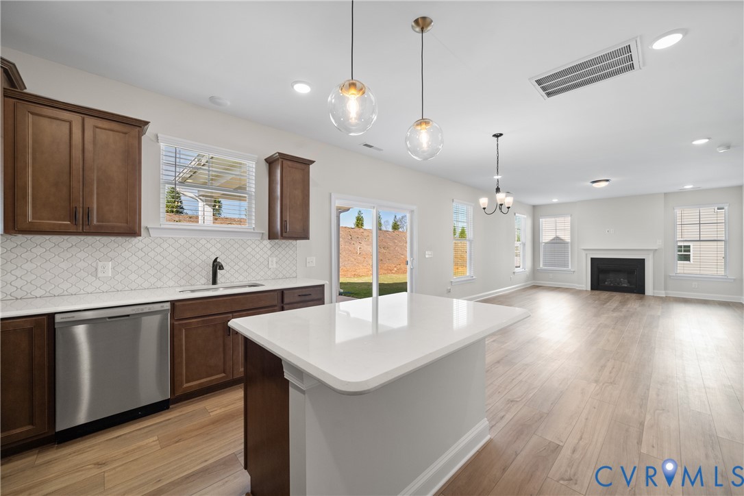 This home is UNDER CONSTRUCTION. The photo represents the plan, not the actual home. Design selections have been made.