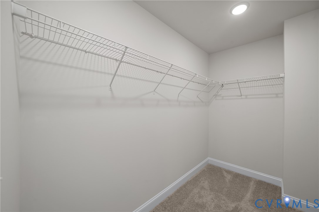 This home is UNDER CONSTRUCTION. The photo represents the plan, not the actual home. Design selections have been made.