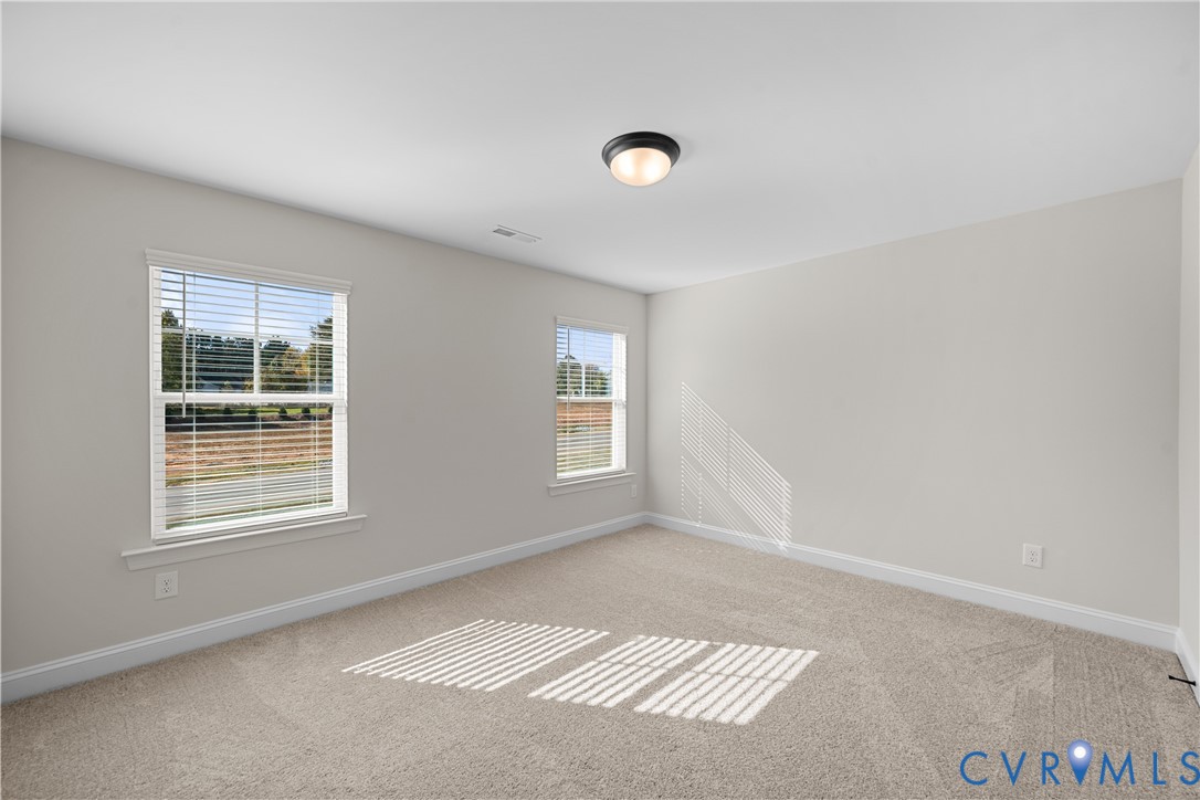 This home is UNDER CONSTRUCTION. The photo represents the plan, not the actual home. Design selections have been made.