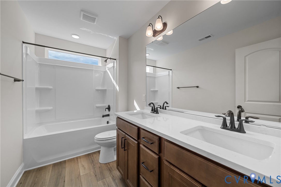 This home is UNDER CONSTRUCTION. The photo represents the plan, not the actual home. Design selections have been made.
