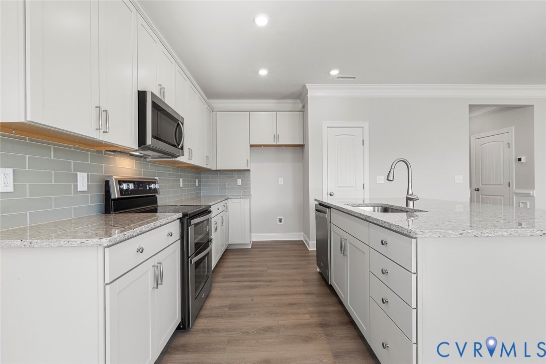 This home is TO BE BUILT. The photo represents the plan, not the actual home. Design selections may vary.