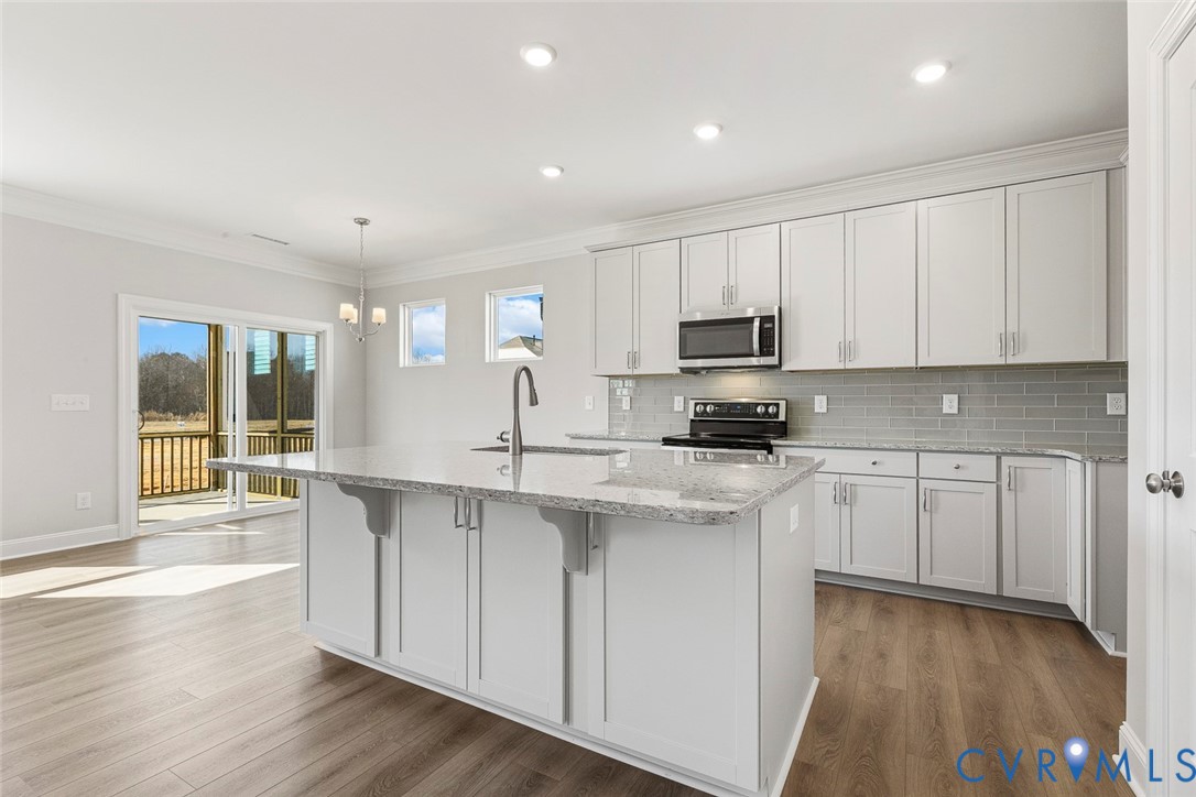 This home is TO BE BUILT. The photo represents the plan, not the actual home. Design selections may vary.