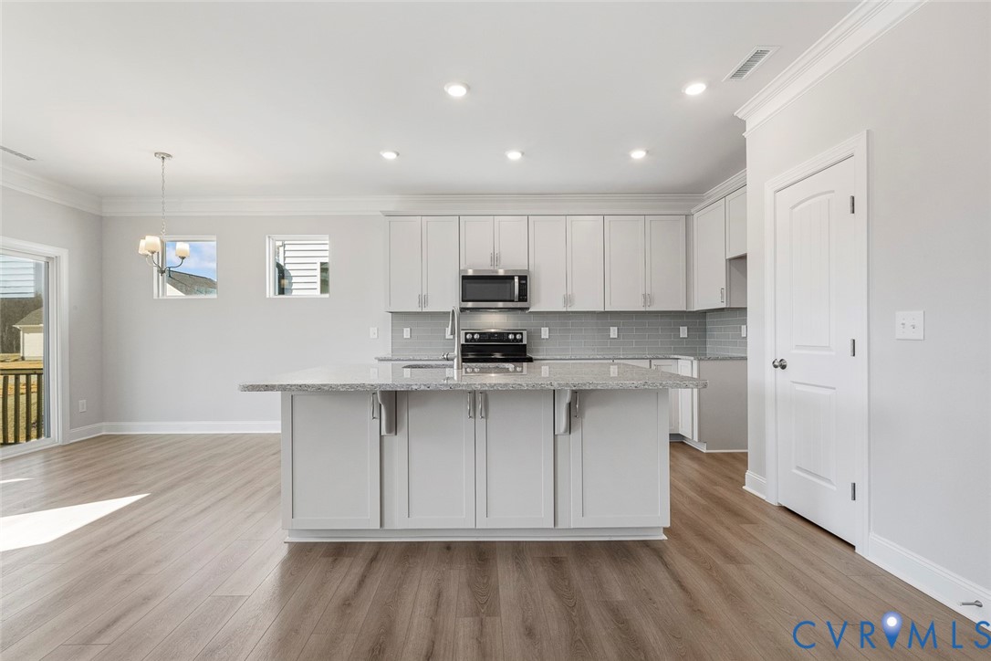 This home is TO BE BUILT. The photo represents the plan, not the actual home. Design selections may vary.