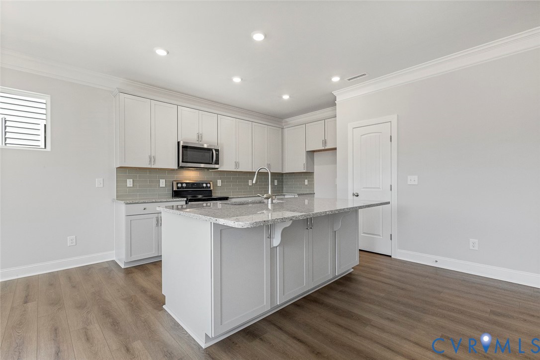 This home is TO BE BUILT. The photo represents the plan, not the actual home. Design selections may vary.