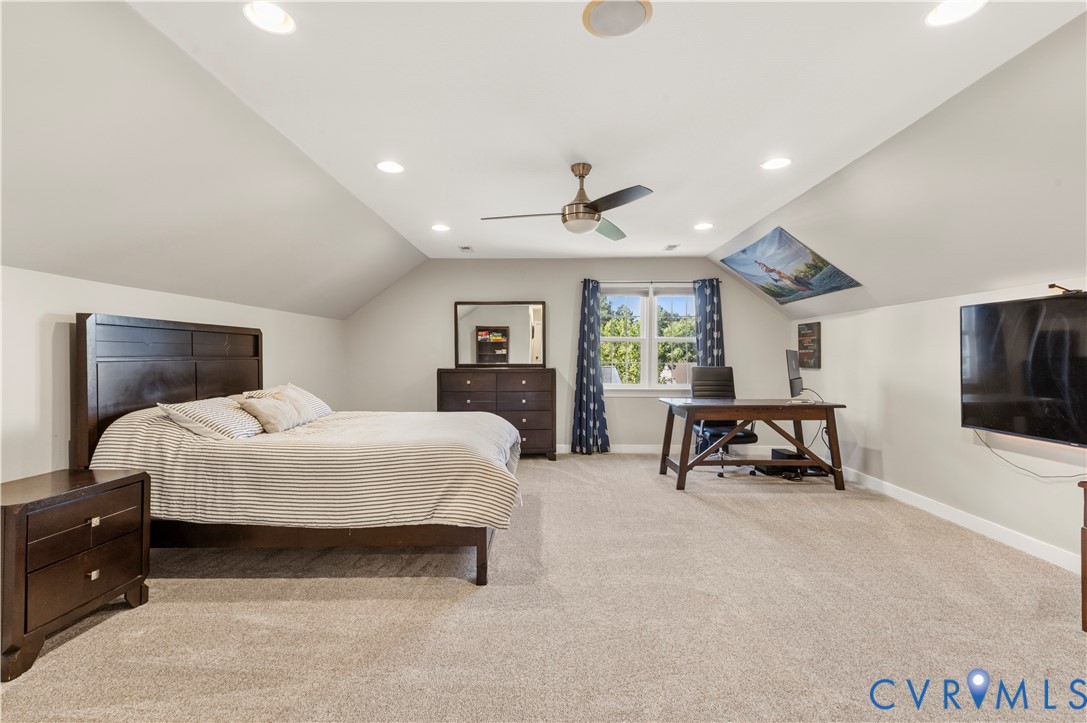 Third floor bedroom with full bath and walk out attic storage. Brand new carpet, recessed lighting and new ceiling fan.