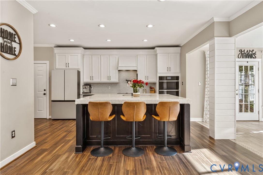 Kitchen features bamboo floors, all new lighting and fixtures.