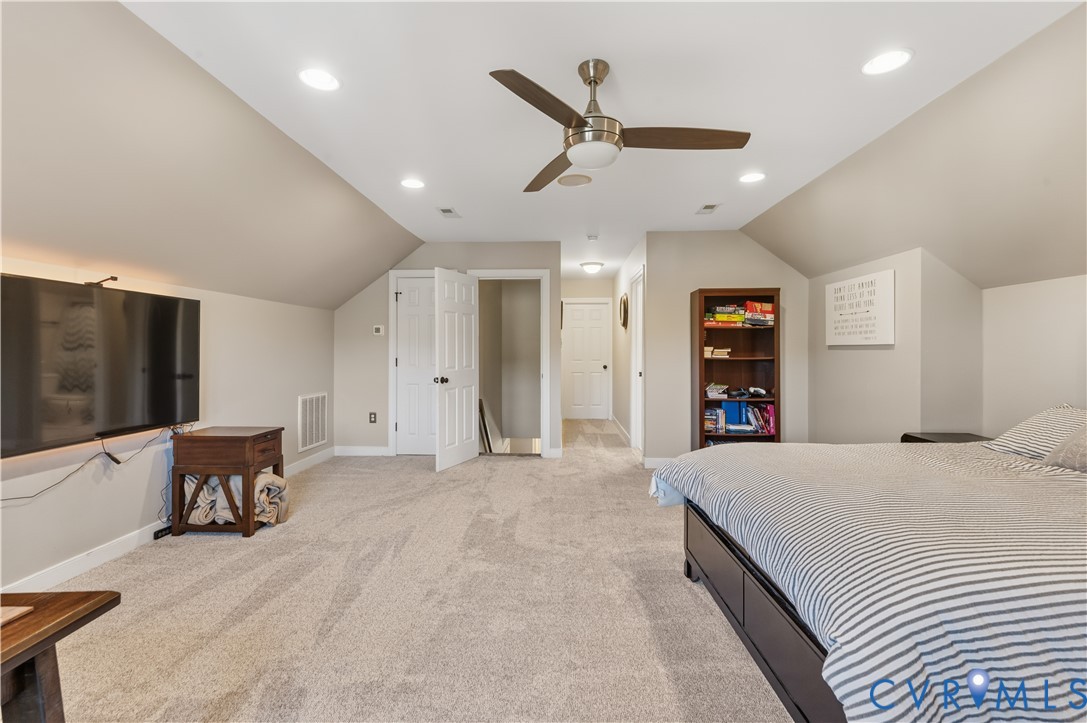 Third floor huge bedroom/bonus room with closet, walk-out storage and full bath.