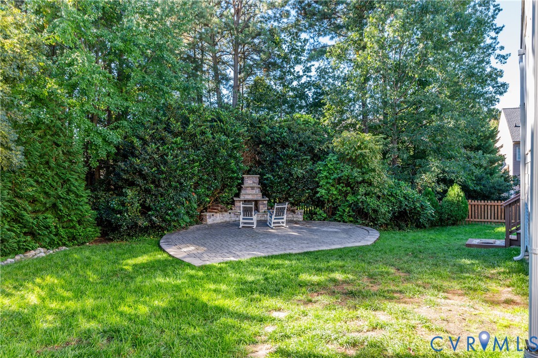 Large lush yard with house resealed and painted recently. Also many of the windows were replaced. Wait until you see how amazing the inside it!! You don't want to miss this one!