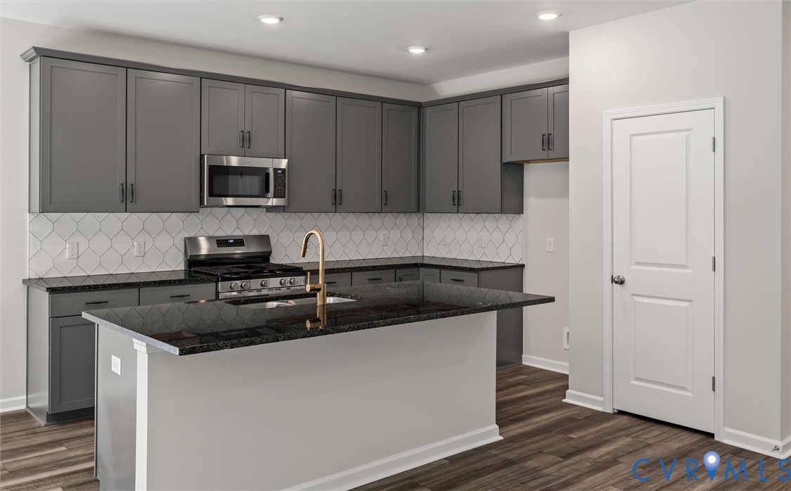 This home is TO BE BUILT. The photo represents the plan, not the actual home. Design selections may vary. This home is TO BE BUILT. The photo represents the plan, not the actual home. Design selections may vary.