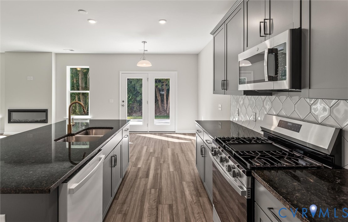 This home is TO BE BUILT. The photo represents the plan, not the actual home. Design selections may vary.