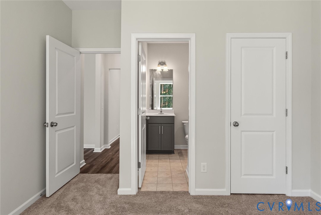First Floor Guest Suite. This home is TO BE BUILT. The photo represents the plan, not the actual home. Design selections may vary.