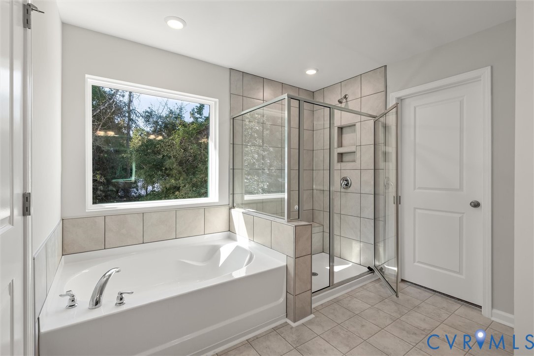 This home is TO BE BUILT. The photo represents the plan, not the actual home. Design selections may vary.