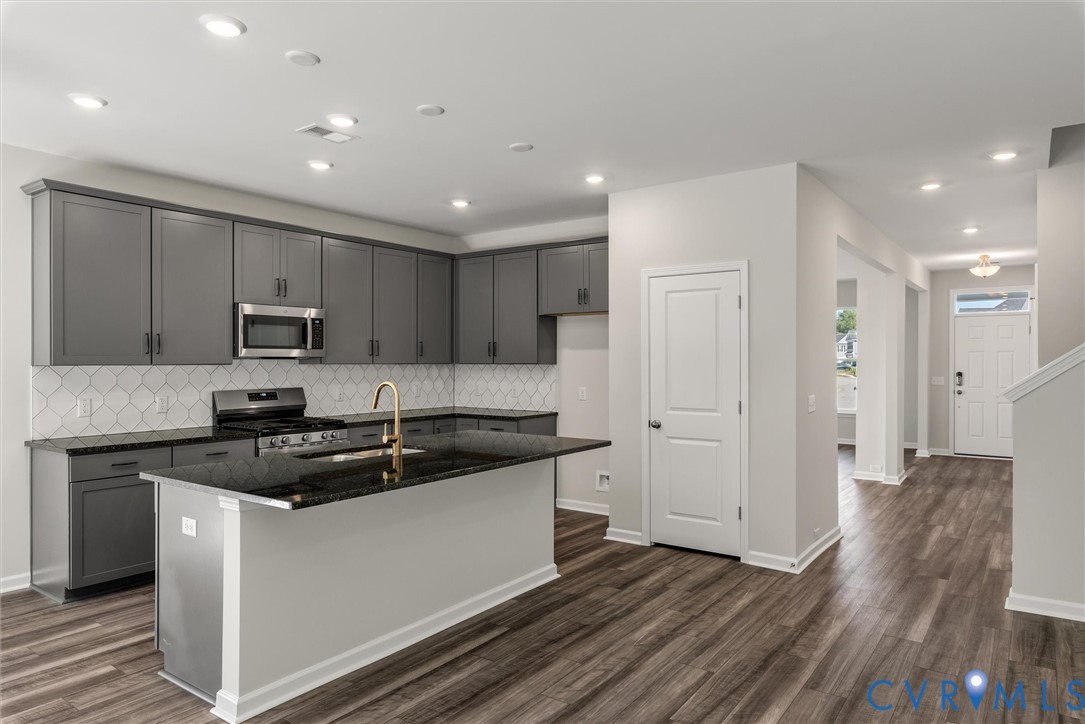 This home is TO BE BUILT. The photo represents the plan, not the actual home. Design selections may vary. This home is TO BE BUILT. The photo represents the plan, not the actual home. Design selections may vary.