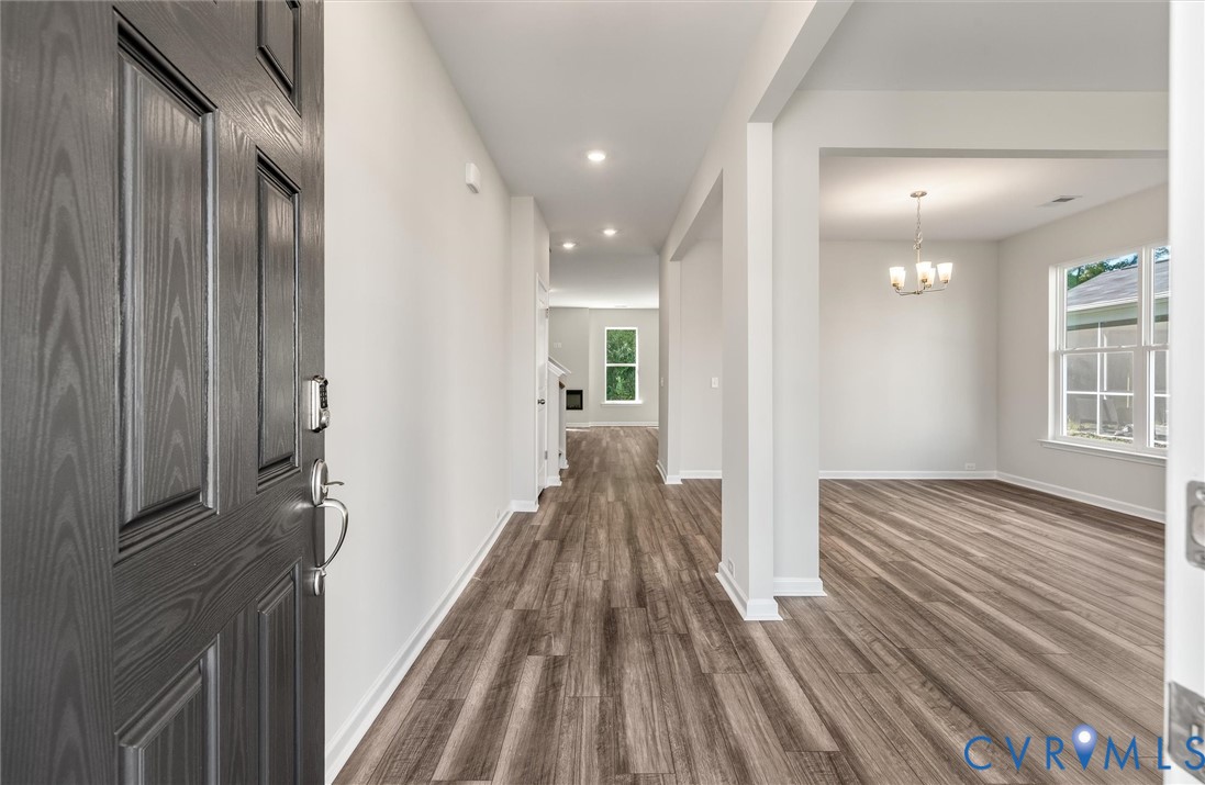 This home is TO BE BUILT. The photo represents the plan, not the actual home. Design selections may vary. This home is TO BE BUILT. The photo represents the plan, not the actual home. Design selections may vary.