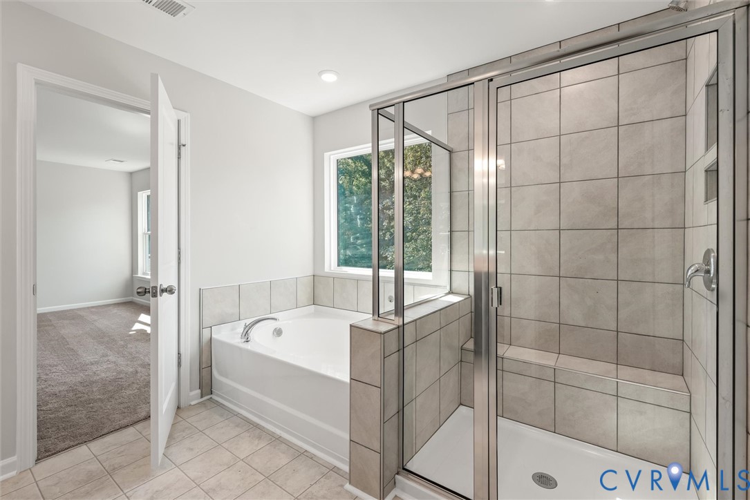 This home is TO BE BUILT. The photo represents the plan, not the actual home. Design selections may vary.