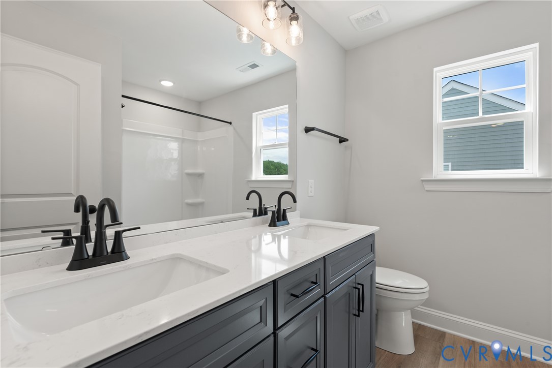 This home is TO BE BUILT. The photo represents the plan, not the actual home. Design selections may vary.