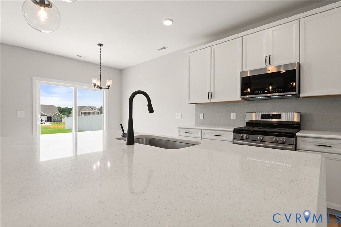 This home is TO BE BUILT. The photo represents the plan, not the actual home. Design selections may vary.