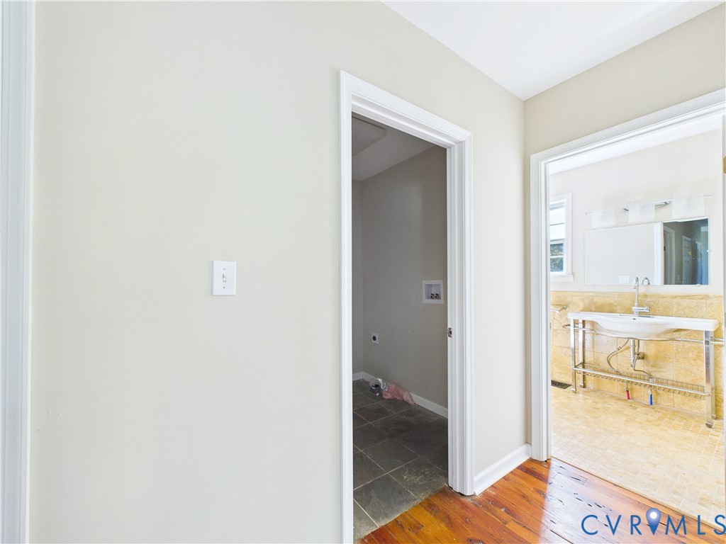 Hallway, main level with laundry and bath.