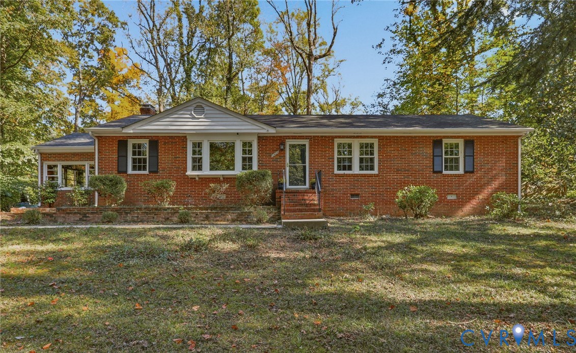 Welcome to 3925 Hickory Road on a half-acre lot
