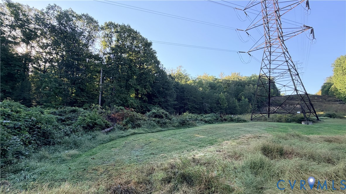 Open lot featuring expansive lawn area and mature trees Open lot featuring expansive lawn area and mature trees