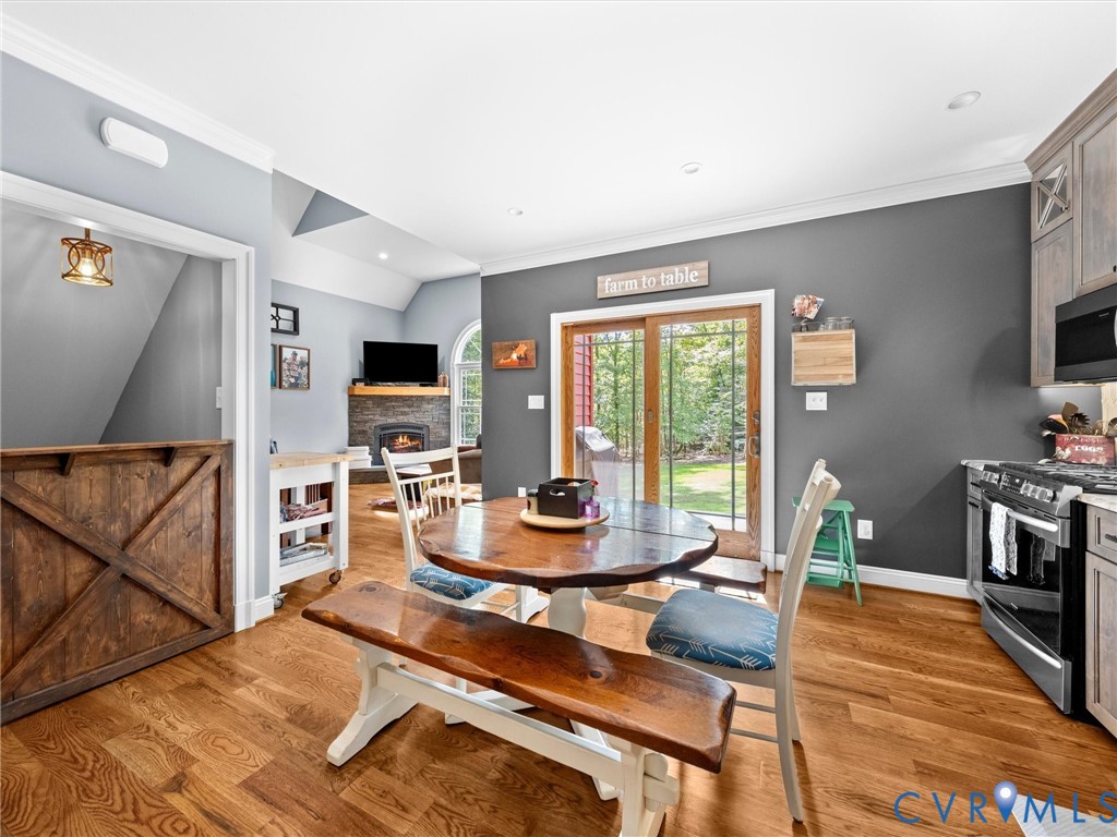 The spacious custom kitchen opens seamlessly to the family room, creating a wonderful flow for everyday living and entertaining. Beautiful hardwood floors, a generous dining area, and a charming half door leading to the basement add character and functionality to this inviting space!