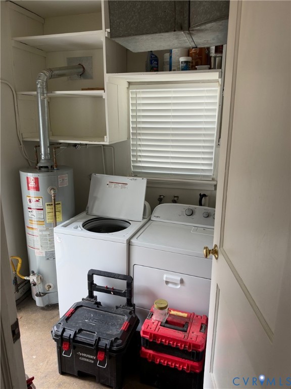 Utility room featuring built-in open shelving, an integrated water heater, and a window with fitted blinds
