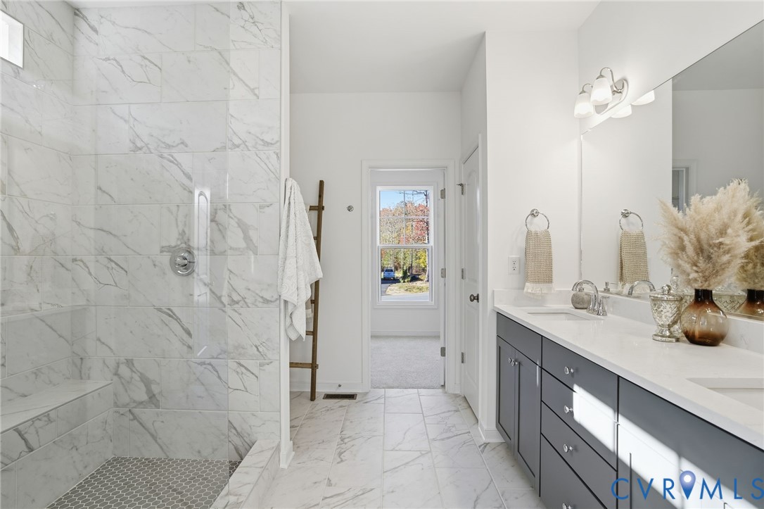 Primary Bathroom -Photo represents the actual home