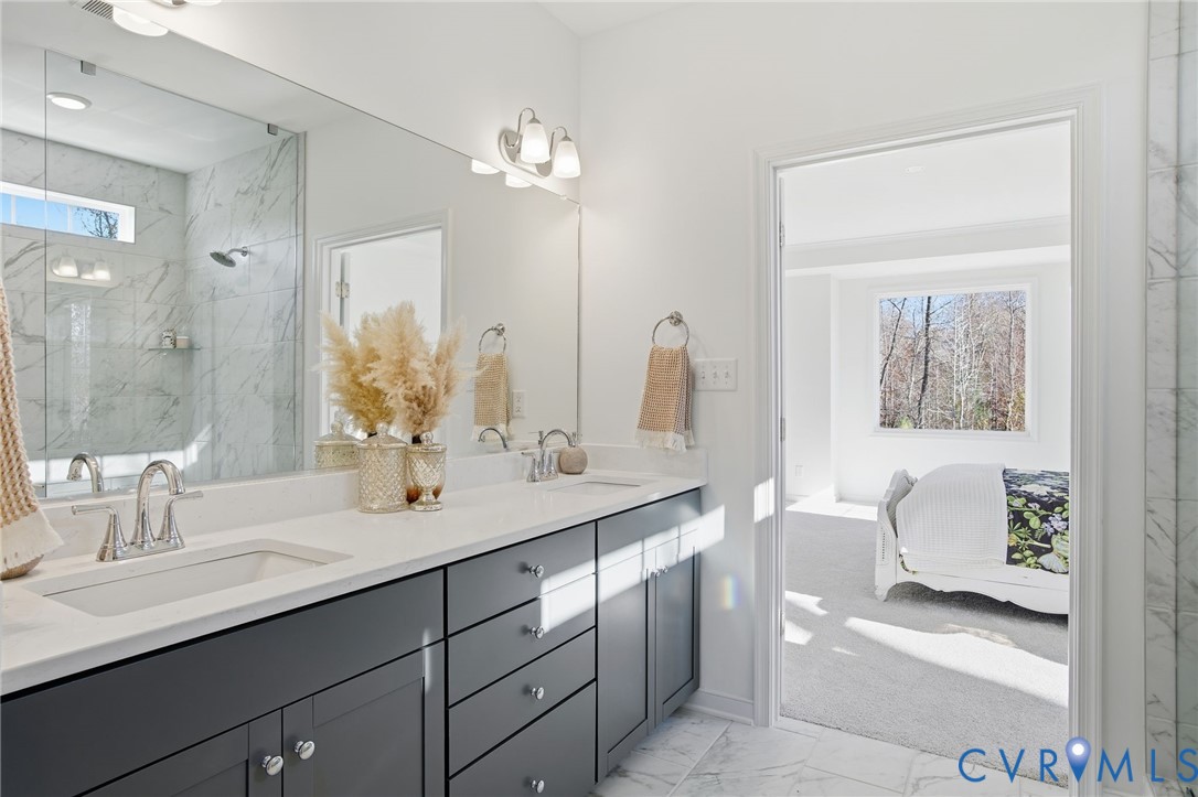 Primary Bathroom -Photo represents the actual home