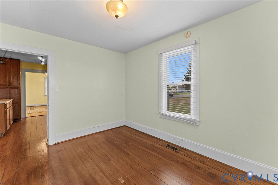 Formal Dining Room with pine floors.