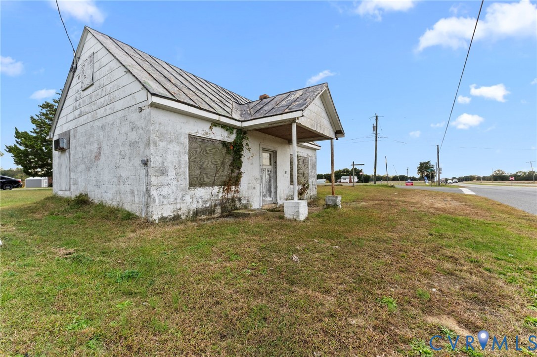 Old Store presently being used as storage. Possible business or rental property. Store has own water & sewer.