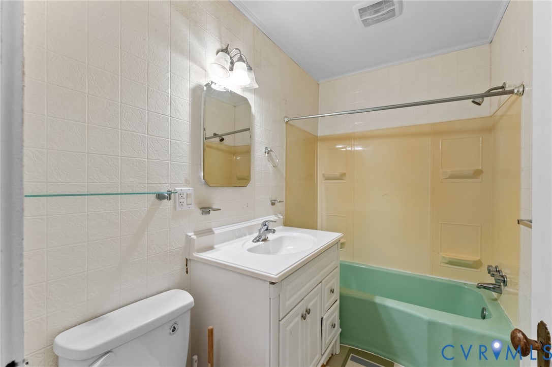 Hall Full Bath with tub & shower.