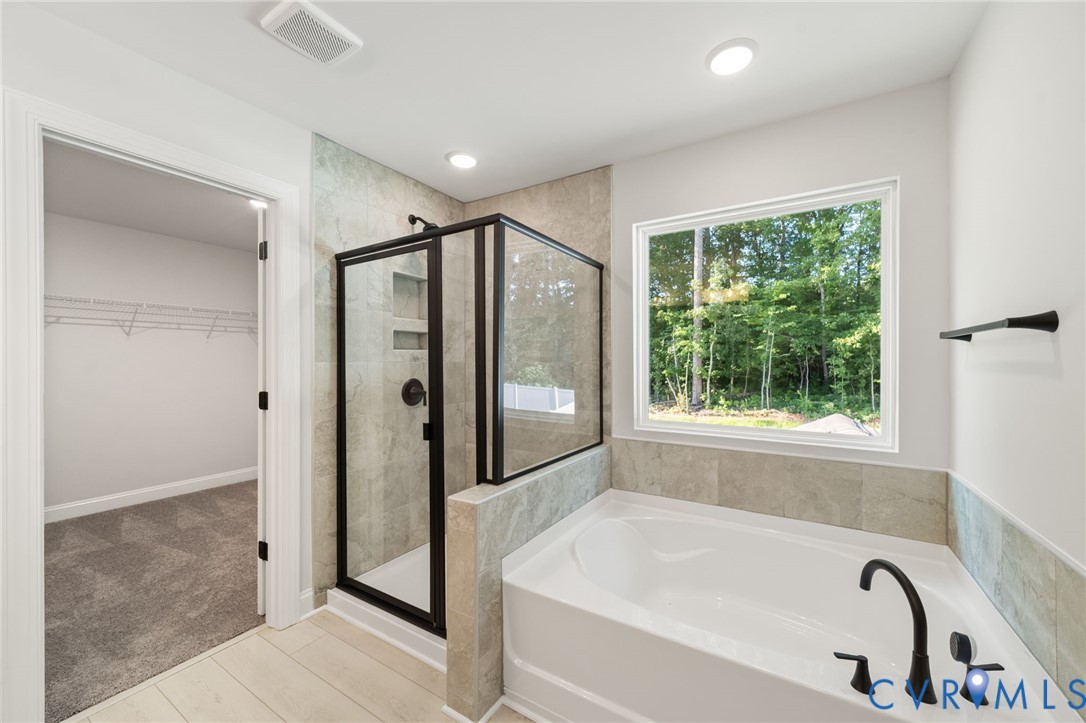 This home is TO BE BUILT. The photo represents the plan, not the actual home. Design selections may vary.