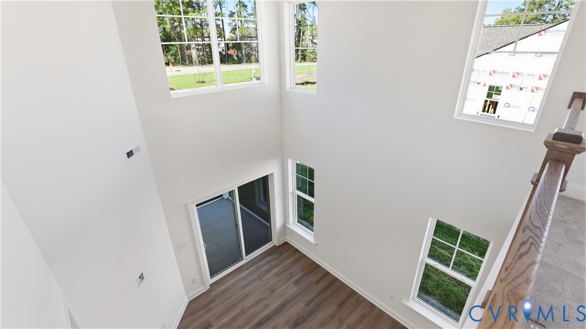 Loft overlooking family room. This home is TO BE BUILT. The photo represents the plan, not the actual home. Design selections may vary.