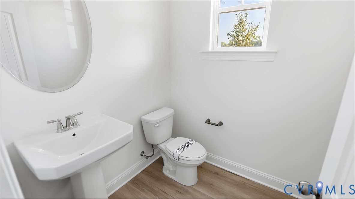 First Floor Powder Room. This home is TO BE BUILT. The photo represents the plan, not the actual home. Design selections may vary.