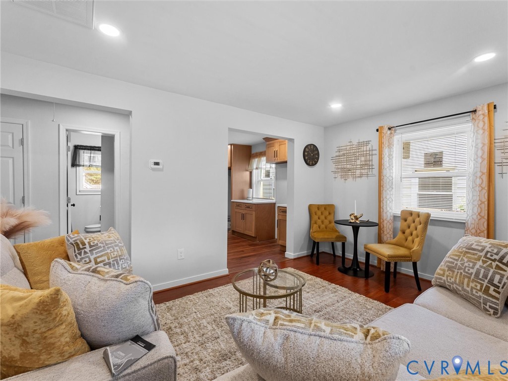 Interior featuring recessed lighting, wood-finish flooring, and natural light via multi-pane windows