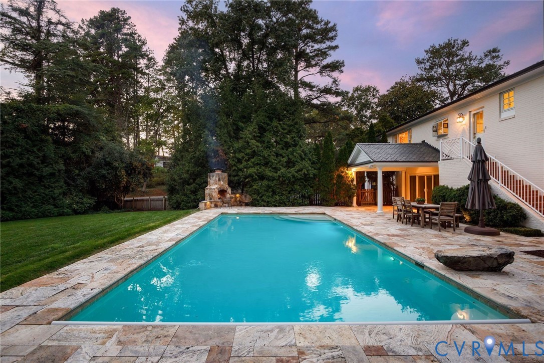Pool and landscaping lighting keep the party going after dark.