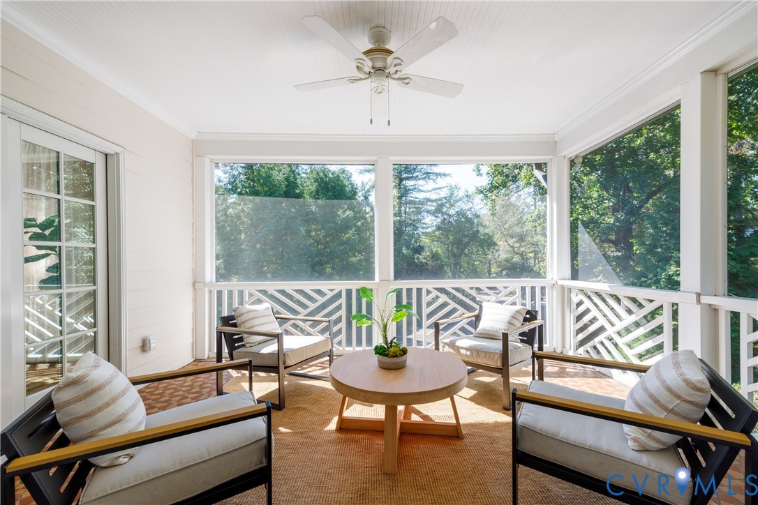 The lovely screened in porch extends the living space to the outdoors for three more seasons.