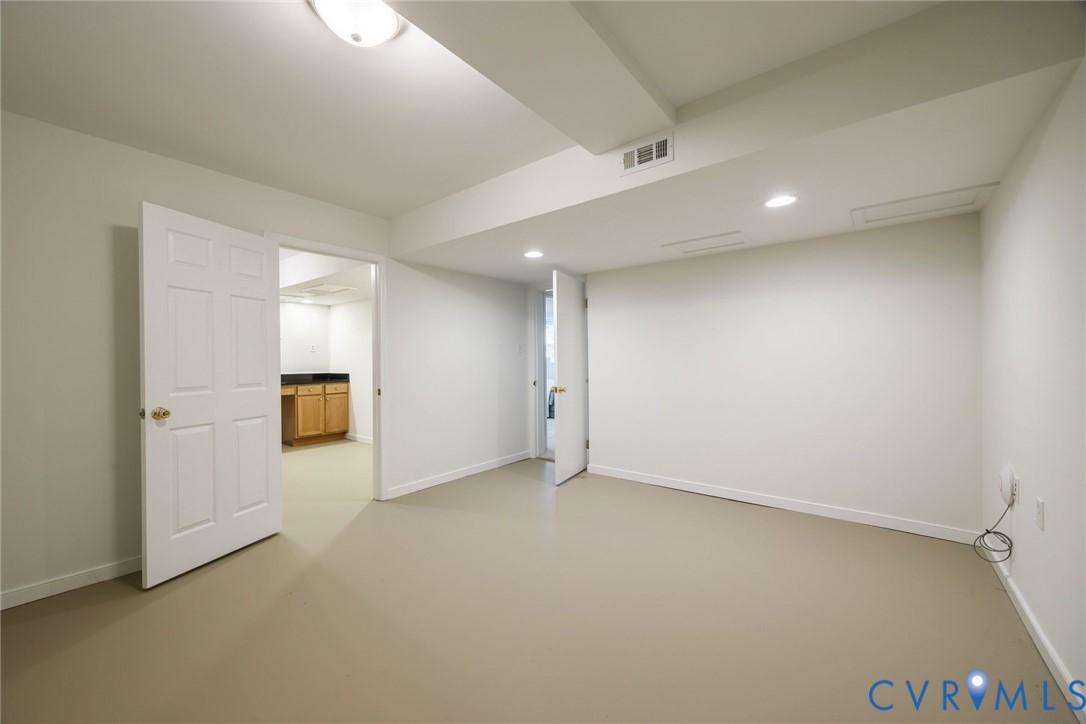 Home office/flex space with an adjacent workshop.