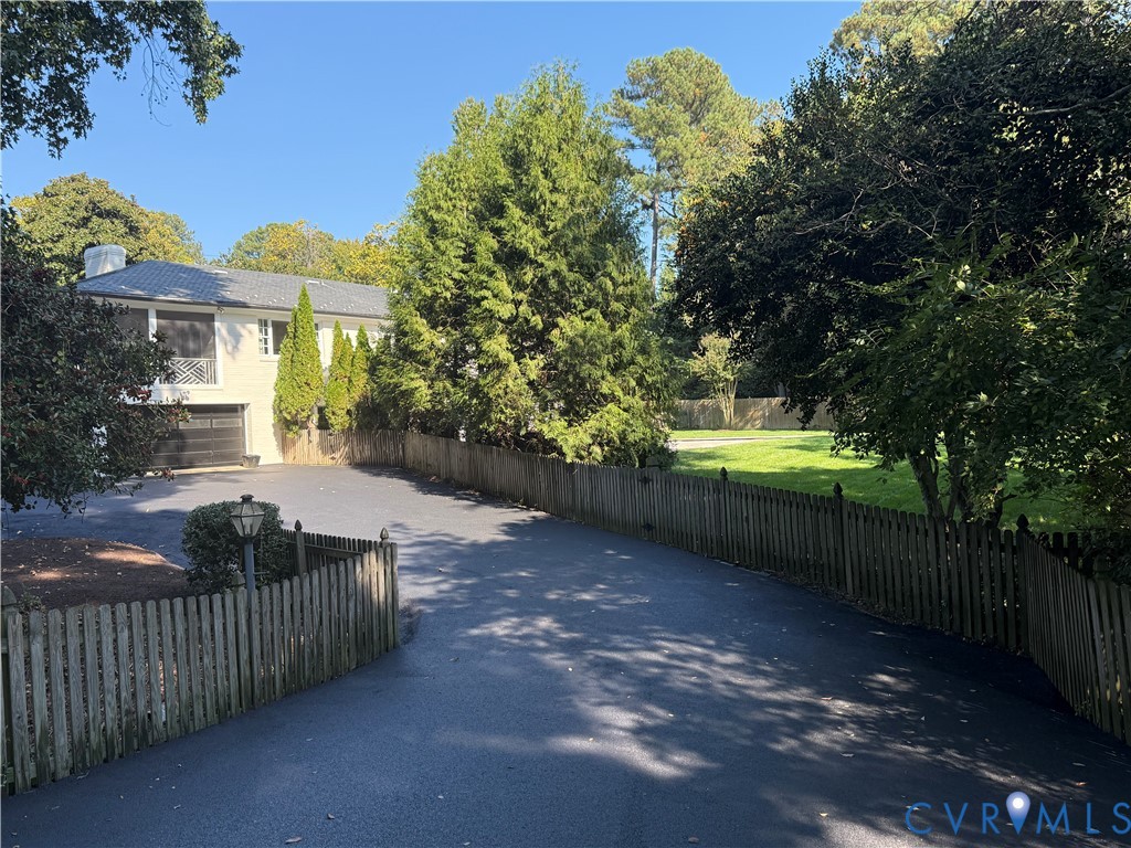 Repaved rear driveway from Country Squire provides another easy access to the property.