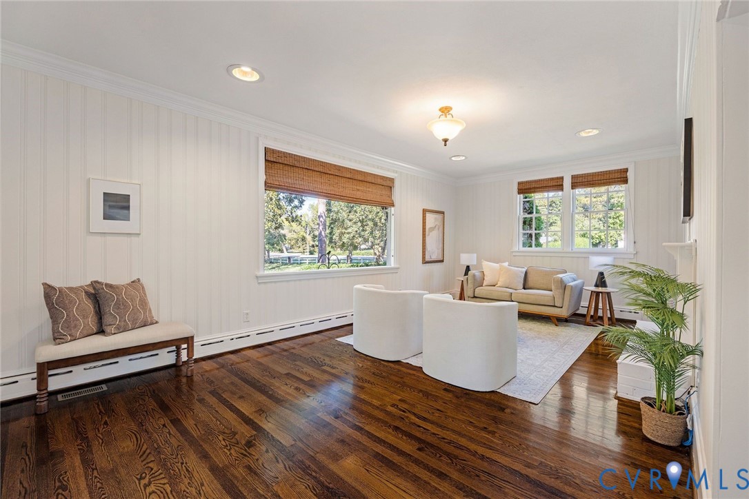 Generous windows provide excellent light and views of the park like property.
